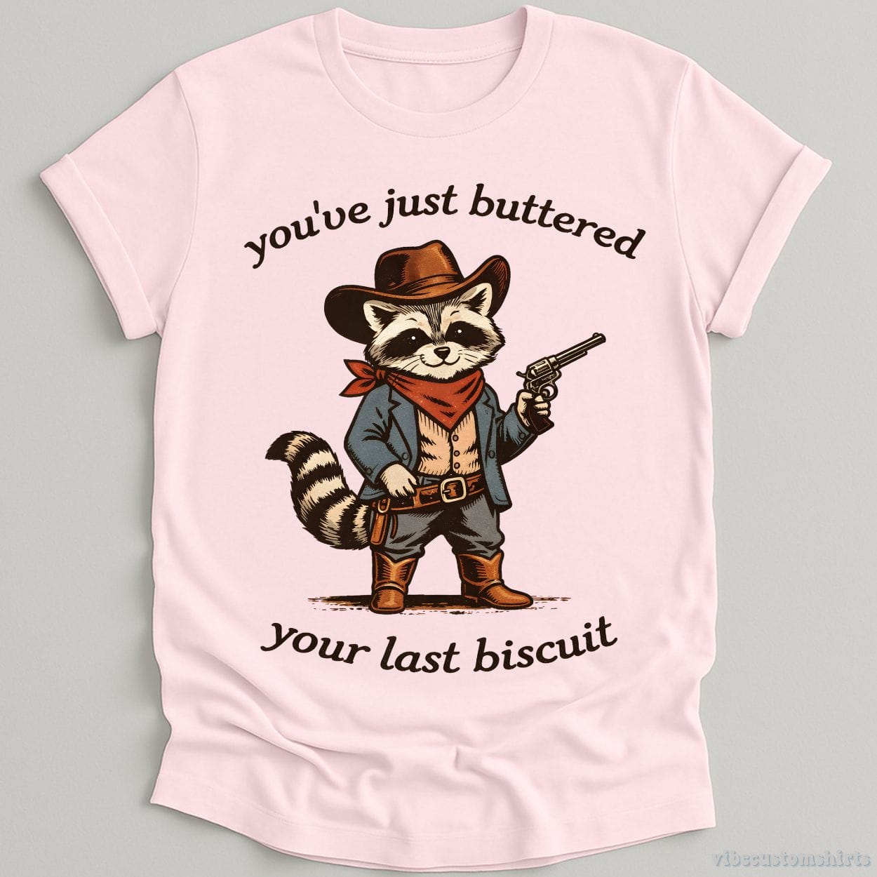 T-Shirt Light Pink / S You’ve Just Buttered Your Last Biscuit Cowboy Raccoon Shirt