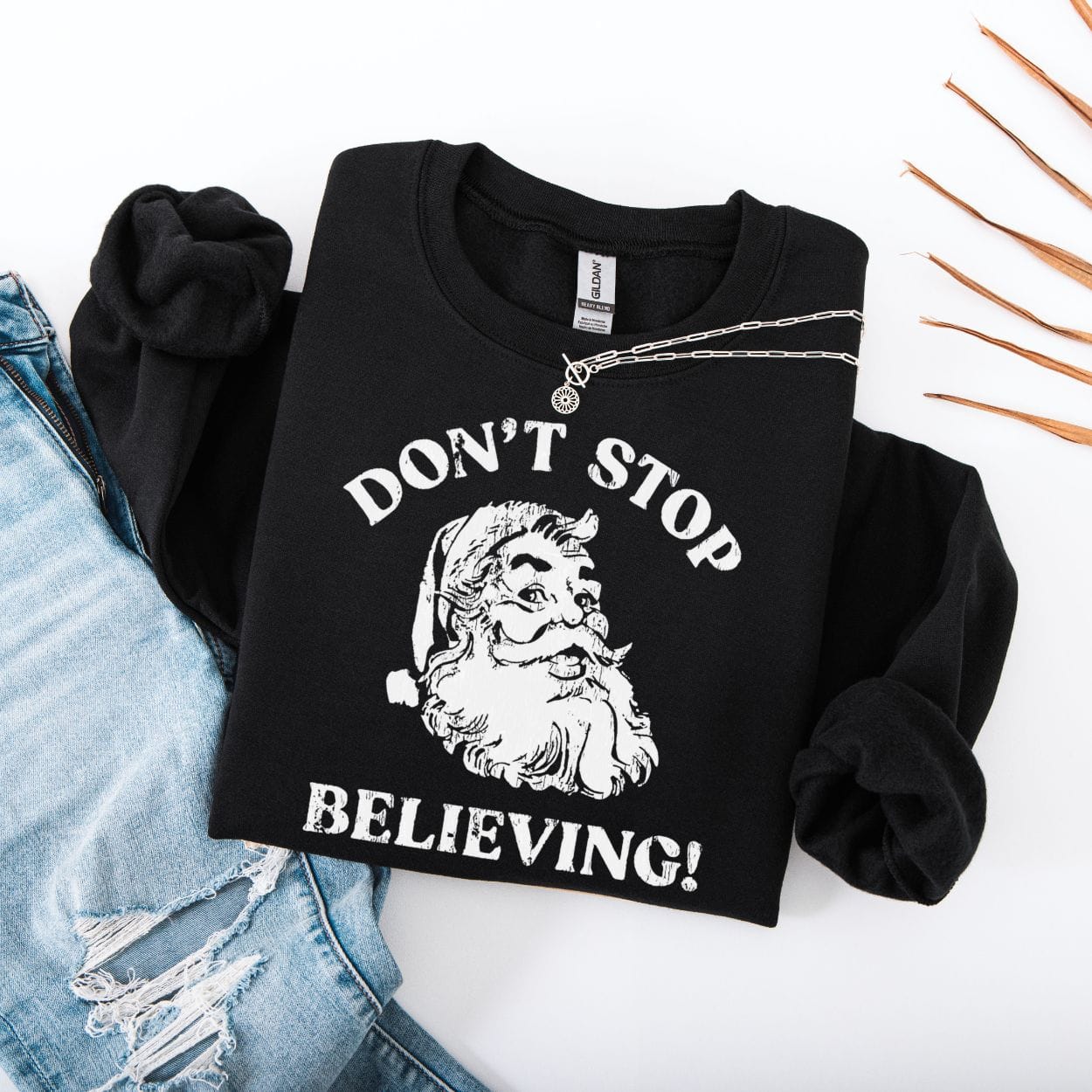 Sweatshirt S / Black Don't Stop Believing Santa Sweatshirt