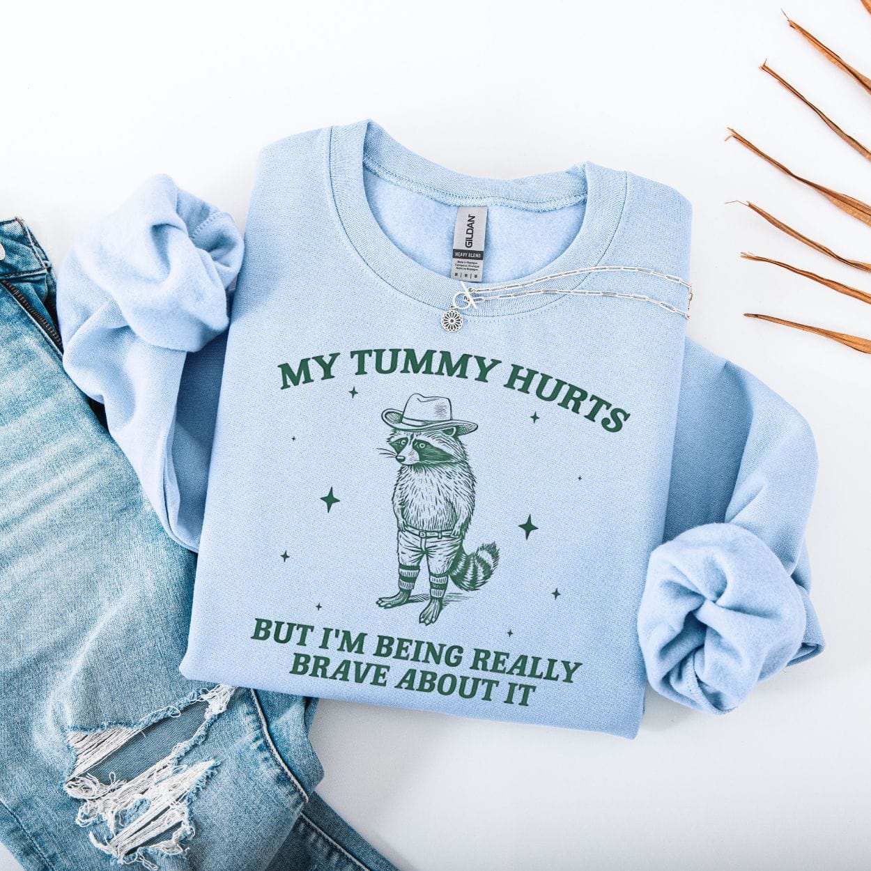 Sweatshirt S / Light Blue My Tummy Hurts But I'm Being Really Brave About It Raccoon Sweatshirt