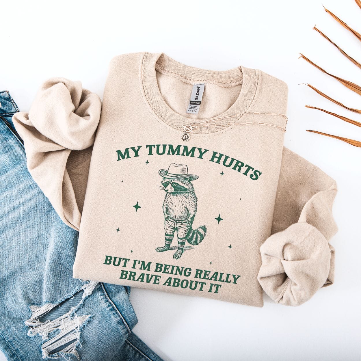 Sweatshirt S / Sand My Tummy Hurts But I'm Being Really Brave About It Raccoon Sweatshirt