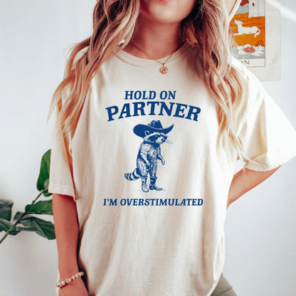 T-Shirt Hold on Partner I'm Overstimulated Cowboy Raccoon Shirt