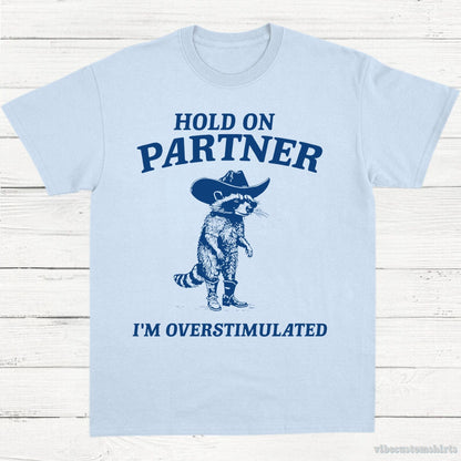 T-Shirt Light Blue / S Hold on Partner I'm Overstimulated Cowboy Raccoon Shirt