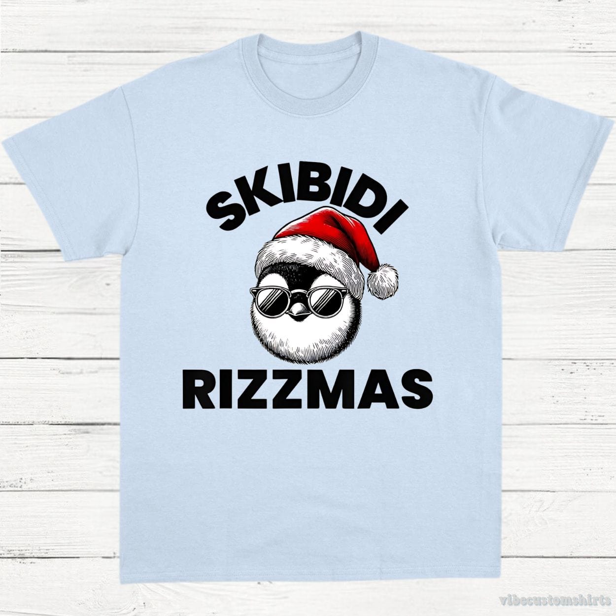 T-Shirt Light Blue / S Skibidi Rizzmas Funny Christmas Penguin Unisex Shirt