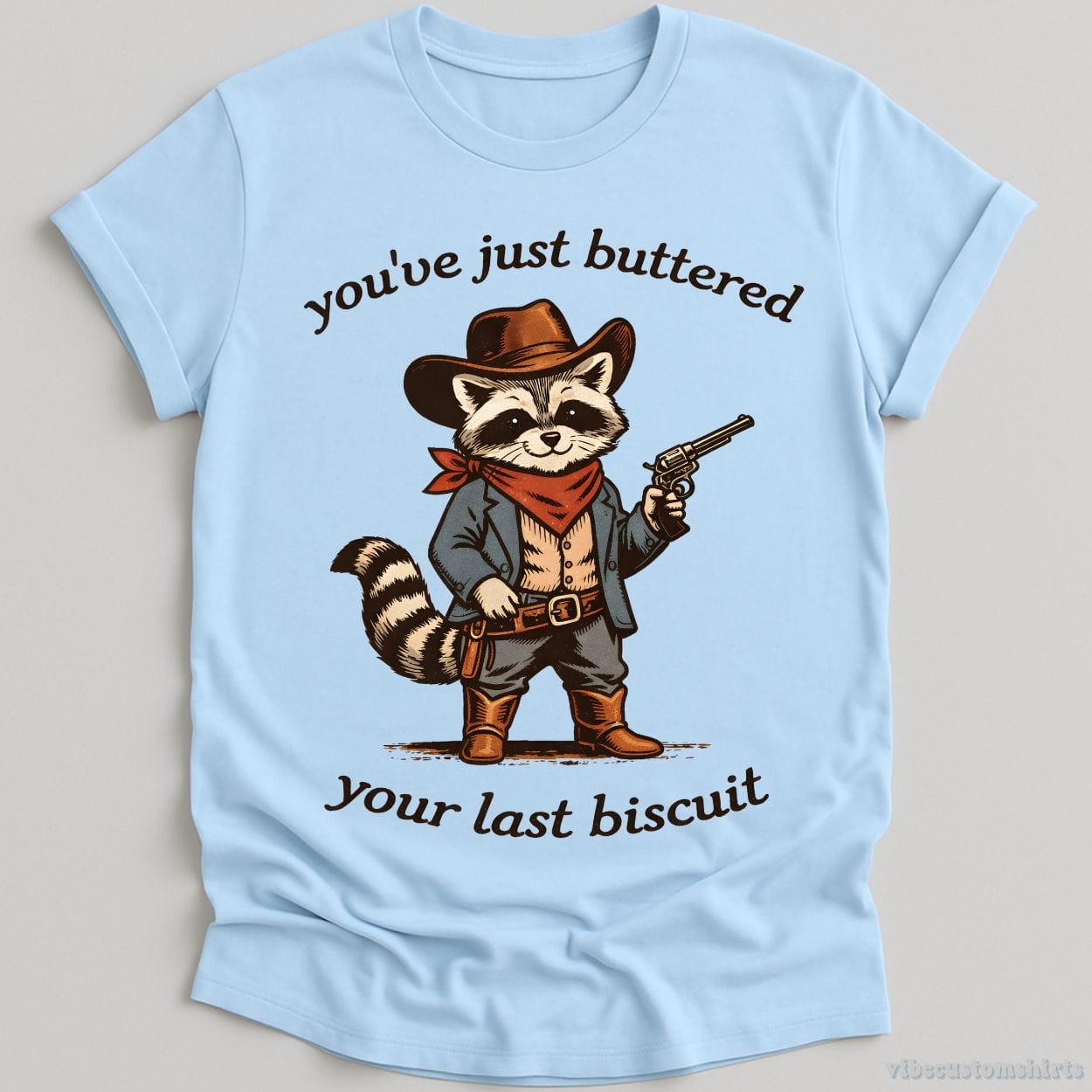 T-Shirt Light Blue / S You’ve Just Buttered Your Last Biscuit Cowboy Raccoon Shirt