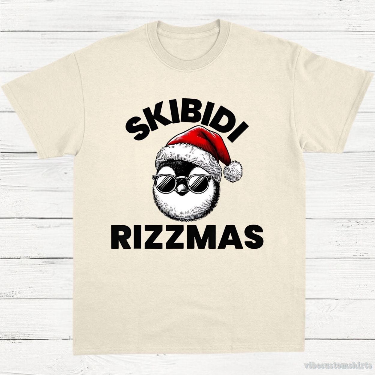 T-Shirt Natural / S Skibidi Rizzmas Funny Christmas Penguin Unisex Shirt