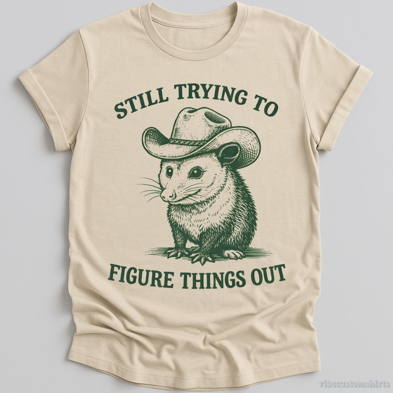 T-Shirt Natural / S Still Trying to Things Figure Out Cowboy Possum Shirt